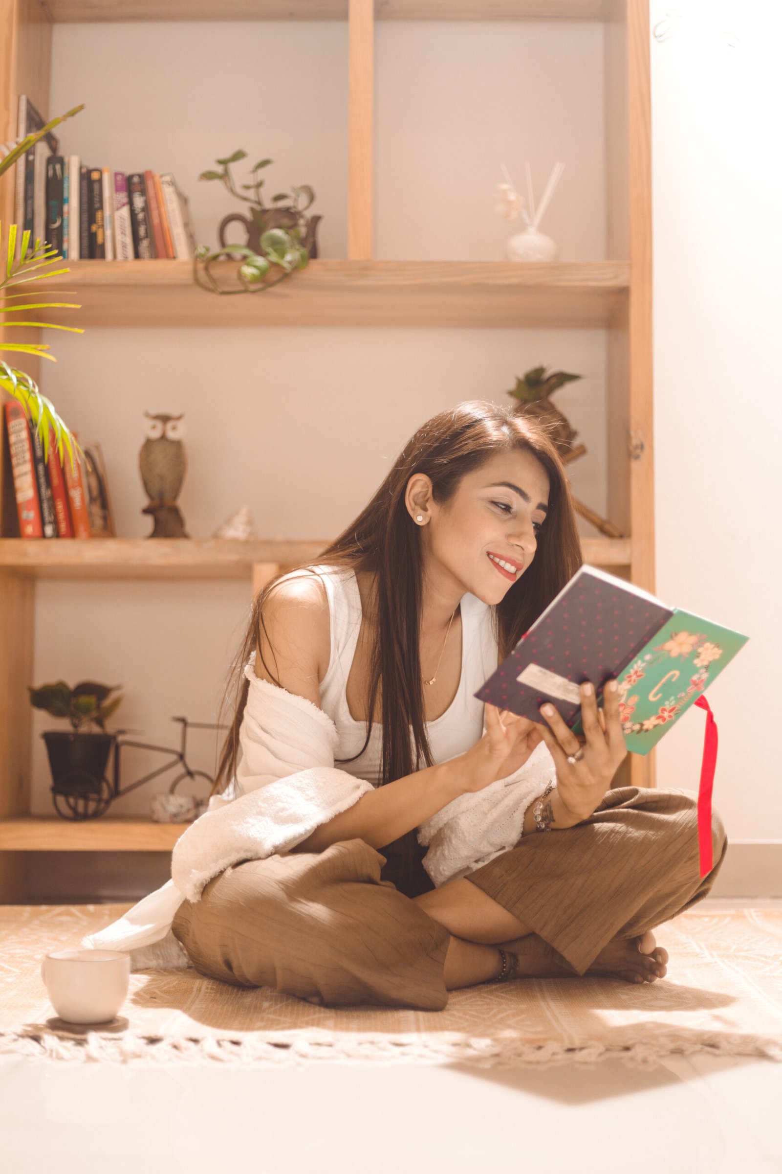 Charu reading during a reflective moment